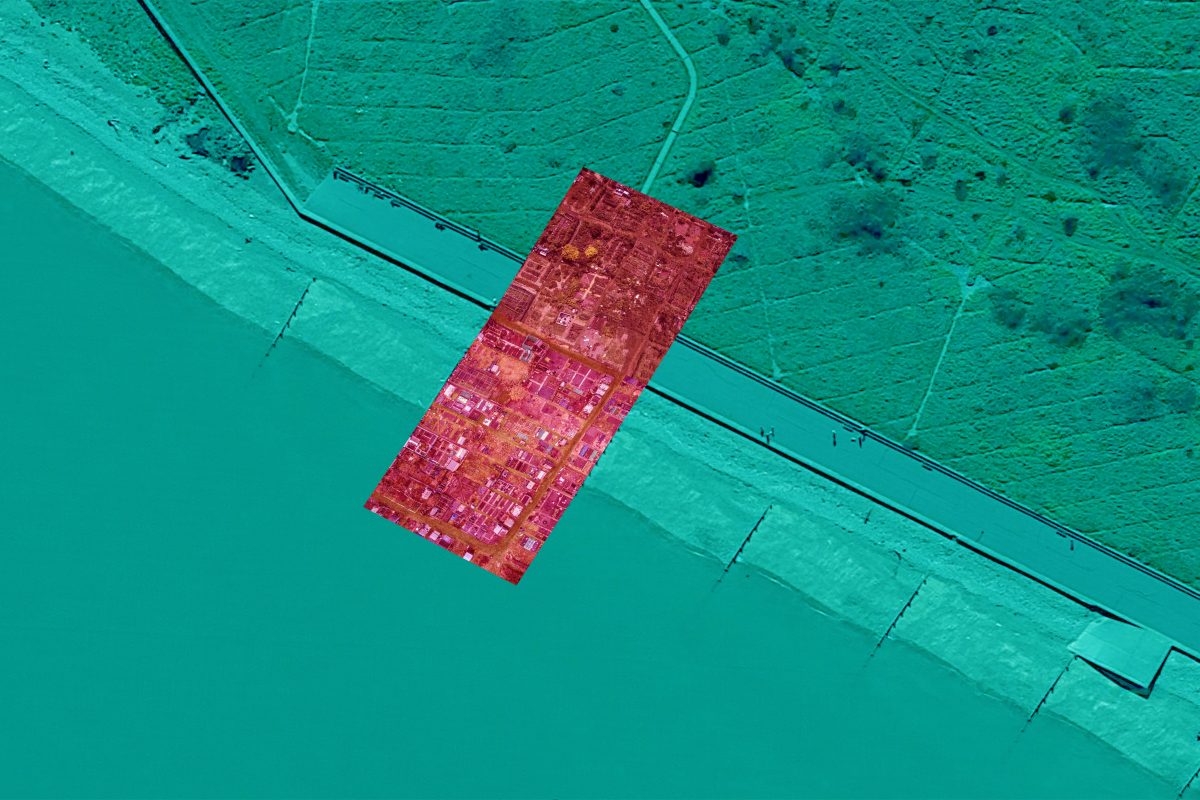 A blue/green tinted aerial image of a section of coastline, overlaid with a red tinted image of an allotment, demonstrating the proposed intertidal allotment as seen from above.